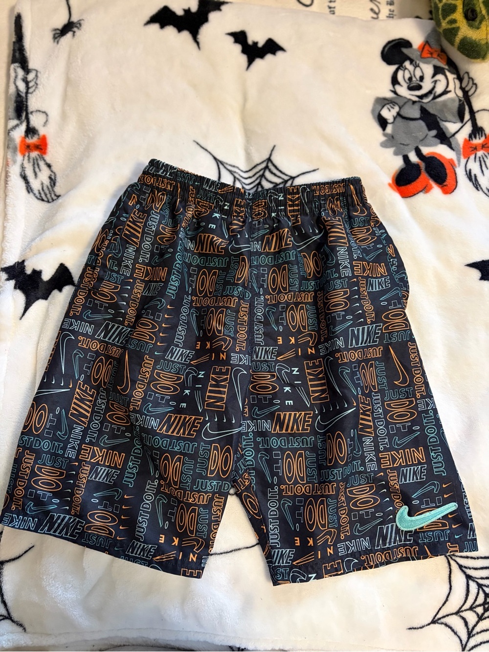Nike Black Athletic Shorts with Teal and Orange Graphic Print